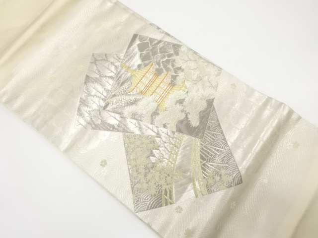 プラチナ二重箔　色紙に寺塔・橋・樹木模様織り出し名古屋帯